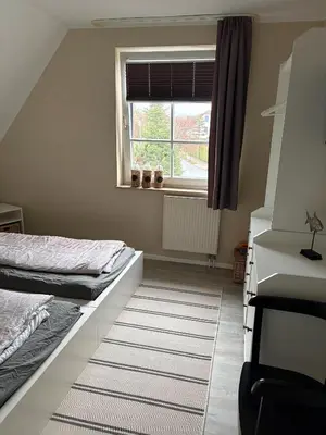 Ein Bett oder Betten in einem Zimmer der Unterkunft Lindenstr 32 a 