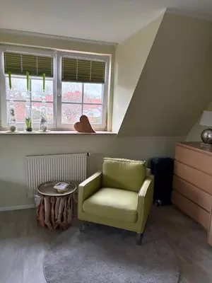 Ein Sitzbereich in der Unterkunft Lindenstr 32 a 
