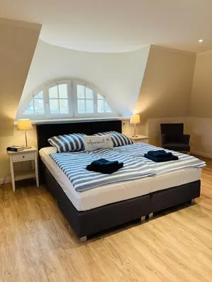 Ein Bett oder Betten in einem Zimmer der Unterkunft Idyllisches Reethaus in Strandnähe mit Comfort