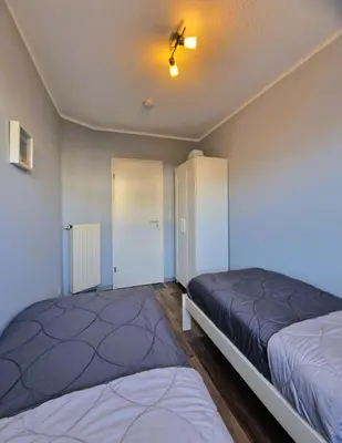 Ein Bett oder Betten in einem Zimmer der Unterkunft Jordanstr 32 Wg 2