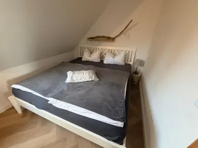 Ein Bett oder Betten in einem Zimmer der Unterkunft Exquisites Ferienhaus 