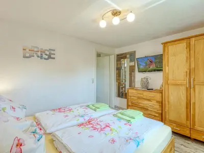 Ein Bett oder Betten in einem Zimmer der Unterkunft Holiday Home Meeresrauschen by Interhome