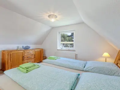 Ein Bett oder Betten in einem Zimmer der Unterkunft Holiday Home Meeresrauschen by Interhome