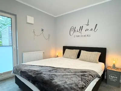 Ein Bett oder Betten in einem Zimmer der Unterkunft Koje Lütt Kirr