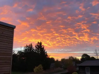 Blick auf den Sonnenuntergang/Sonnenaufgang von der Ferienwohnung aus oder aus der Nähe