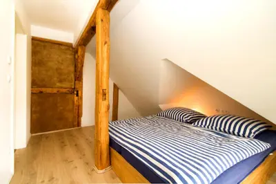 Ein Bett oder Betten in einem Zimmer der Unterkunft Kapitänsdeck