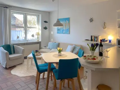 Ein Sitzbereich in der Unterkunft Kapitänsgarten W16