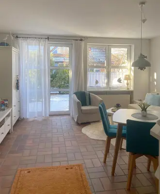 Ein Sitzbereich in der Unterkunft Kapitänsgarten W16