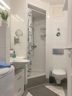 Ein Badezimmer in der Unterkunft Kapitänsgarten W16