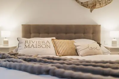 Ein Bett oder Betten in einem Zimmer der Unterkunft Aura