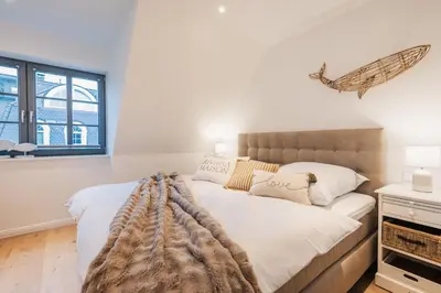 Ein Bett oder Betten in einem Zimmer der Unterkunft Aura