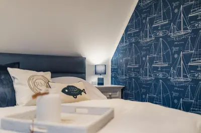 Ein Bett oder Betten in einem Zimmer der Unterkunft Aura