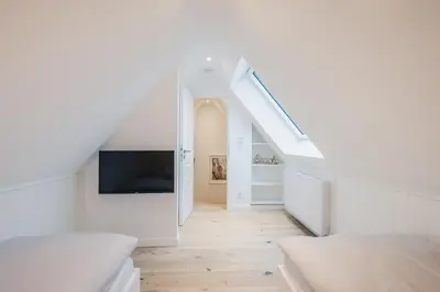 Ein Bett oder Betten in einem Zimmer der Unterkunft Aura