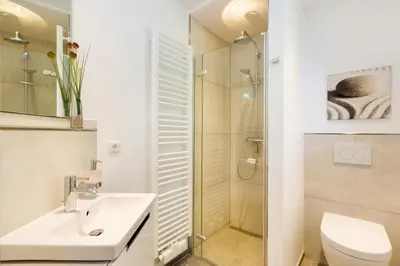 Ein Badezimmer in der Unterkunft Portus