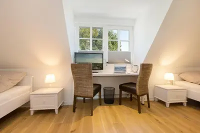 Ein Bett oder Betten in einem Zimmer der Unterkunft Portus