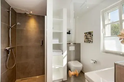 Ein Badezimmer in der Unterkunft Portus