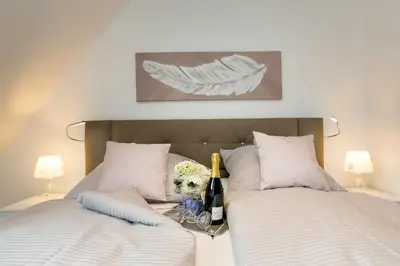 Ein Bett oder Betten in einem Zimmer der Unterkunft Portus