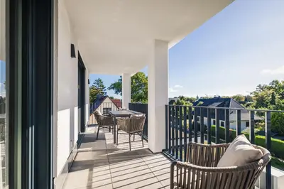 Ein Balkon oder eine Terrasse in der Unterkunft Strandvilla Zingst Appartement 15 2 OG
