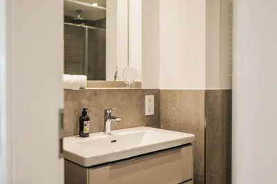Ein Badezimmer in der Unterkunft Strandvilla Zingst Appartement 04 EG