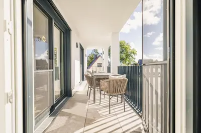 Ein Balkon oder eine Terrasse in der Unterkunft Strandvilla Zingst Appartement 10 1 OG
