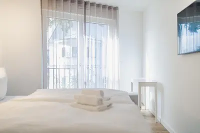 Ein Bett oder Betten in einem Zimmer der Unterkunft Strandvilla Zingst Appartement 06 1 OG