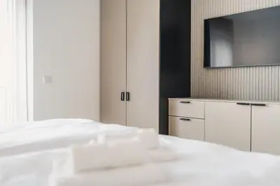 Ein Bett oder Betten in einem Zimmer der Unterkunft Strandvilla Zingst Appartement 09 1 OG