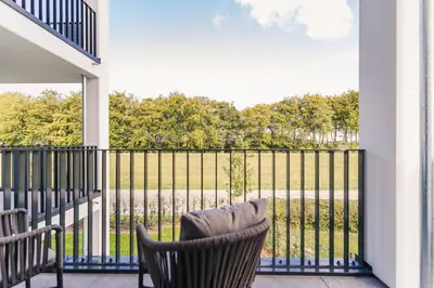 Ein Balkon oder eine Terrasse in der Unterkunft Strandvilla Zingst Appartement 09 1 OG