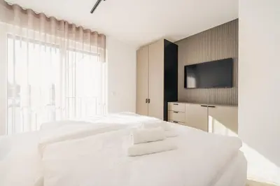 Ein Bett oder Betten in einem Zimmer der Unterkunft Strandvilla Zingst Appartement 09 1 OG