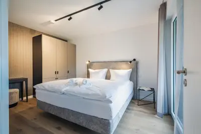 Ein Bett oder Betten in einem Zimmer der Unterkunft Strandvilla Zingst Appartement 12 2 OG