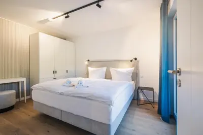 Ein Bett oder Betten in einem Zimmer der Unterkunft Strandvilla Zingst Appartement 07 1 OG