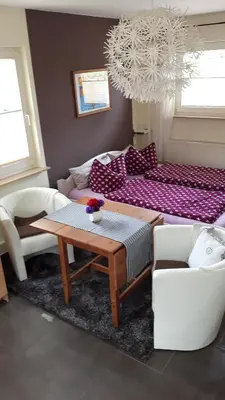 Ein Bett oder Betten in einem Zimmer der Unterkunft Karinas Apartment