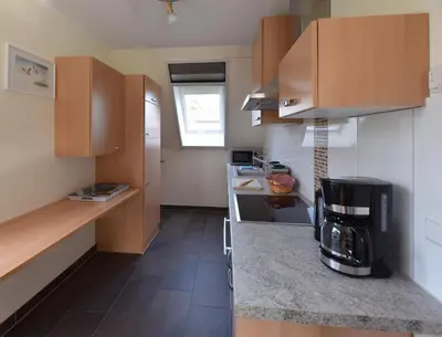 Küche/Küchenzeile in der Unterkunft Ferienwohnung „Hürsch“