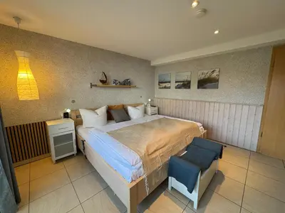 Ein Bett oder Betten in einem Zimmer der Unterkunft Meerurlaub-Barrierefrei