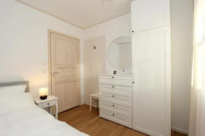 Ein Bett oder Betten in einem Zimmer der Unterkunft Ilse