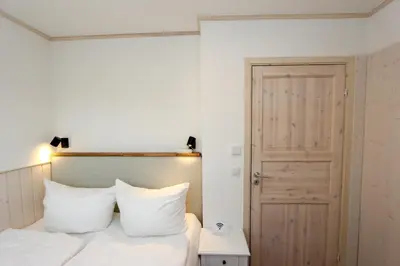 Ein Bett oder Betten in einem Zimmer der Unterkunft Ilse
