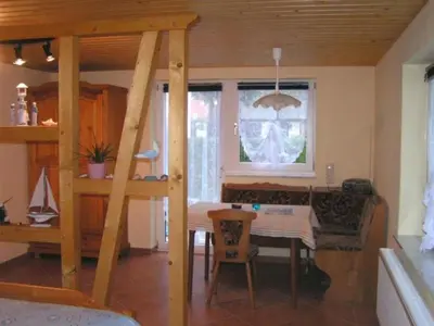Ein Bett oder Betten in einem Zimmer der Unterkunft Holiday Home Ferienbungalow mit Terrasse und Angelplatz by Interhome