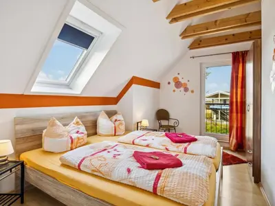Ein Bett oder Betten in einem Zimmer der Unterkunft Holiday Home Ferienhaus-Bodden by Interhome