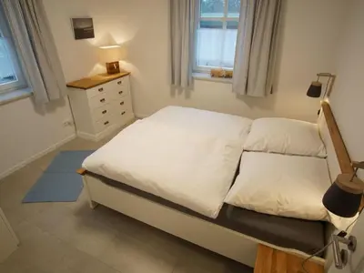 Ein Bett oder Betten in einem Zimmer der Unterkunft Holiday Home Admiral's Corner Luv by Interhome