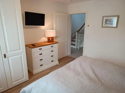 Ein Bett oder Betten in einem Zimmer der Unterkunft Holiday Home Admiral's Corner Lee by Interhome