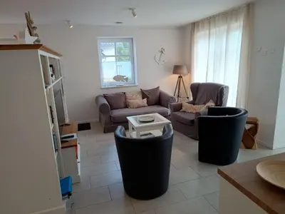 Ein Sitzbereich in der Unterkunft Holiday Home Admiral's Corner Lee by Interhome