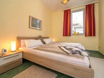 Ein Bett oder Betten in einem Zimmer der Unterkunft Morgensonne - Urlaub unter´m Gründach