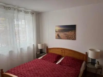 Ein Bett oder Betten in einem Zimmer der Unterkunft Ferienwohnung Thiele