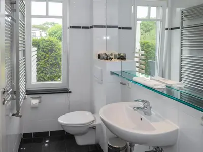 Ein Badezimmer in der Unterkunft Burg Roland Wohnung 03