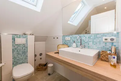 Ein Badezimmer in der Unterkunft Fischers Lütte 08