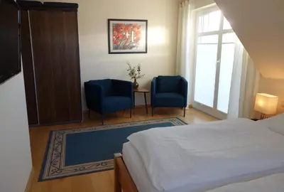 Ein Bett oder Betten in einem Zimmer der Unterkunft Neue Reihe 64 Haus Helene