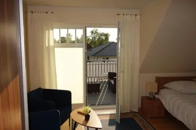 Ein Bett oder Betten in einem Zimmer der Unterkunft Neue Reihe 64 Haus Helene