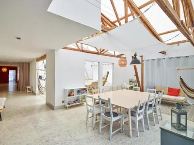 Ein Sitzbereich in der Unterkunft Ferienhaus Hängematte für Familien, Freunde und Gruppen