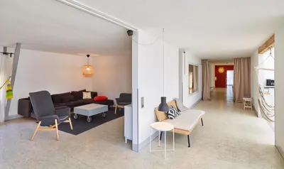 Ein Sitzbereich in der Unterkunft Ferienhaus Hängematte für Familien, Freunde und Gruppen