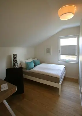 Ein Bett oder Betten in einem Zimmer der Unterkunft 