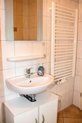 Ein Badezimmer in der Unterkunft Strandstr 4b 